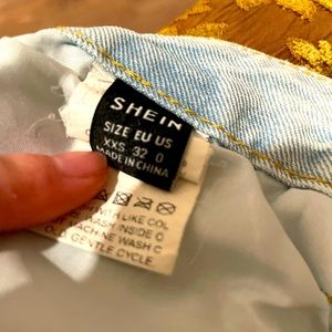 Distressed ripped jean shorts, never worn but no tags